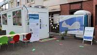 Die bunte Anlaufstelle für das Quartier während der Umbauzeiten: ein Baucontainer. Foto. Stadt. LD. Frei.